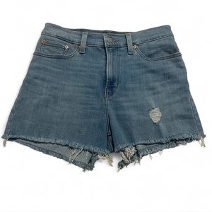 Levi’s medium wash distressed denim shorts